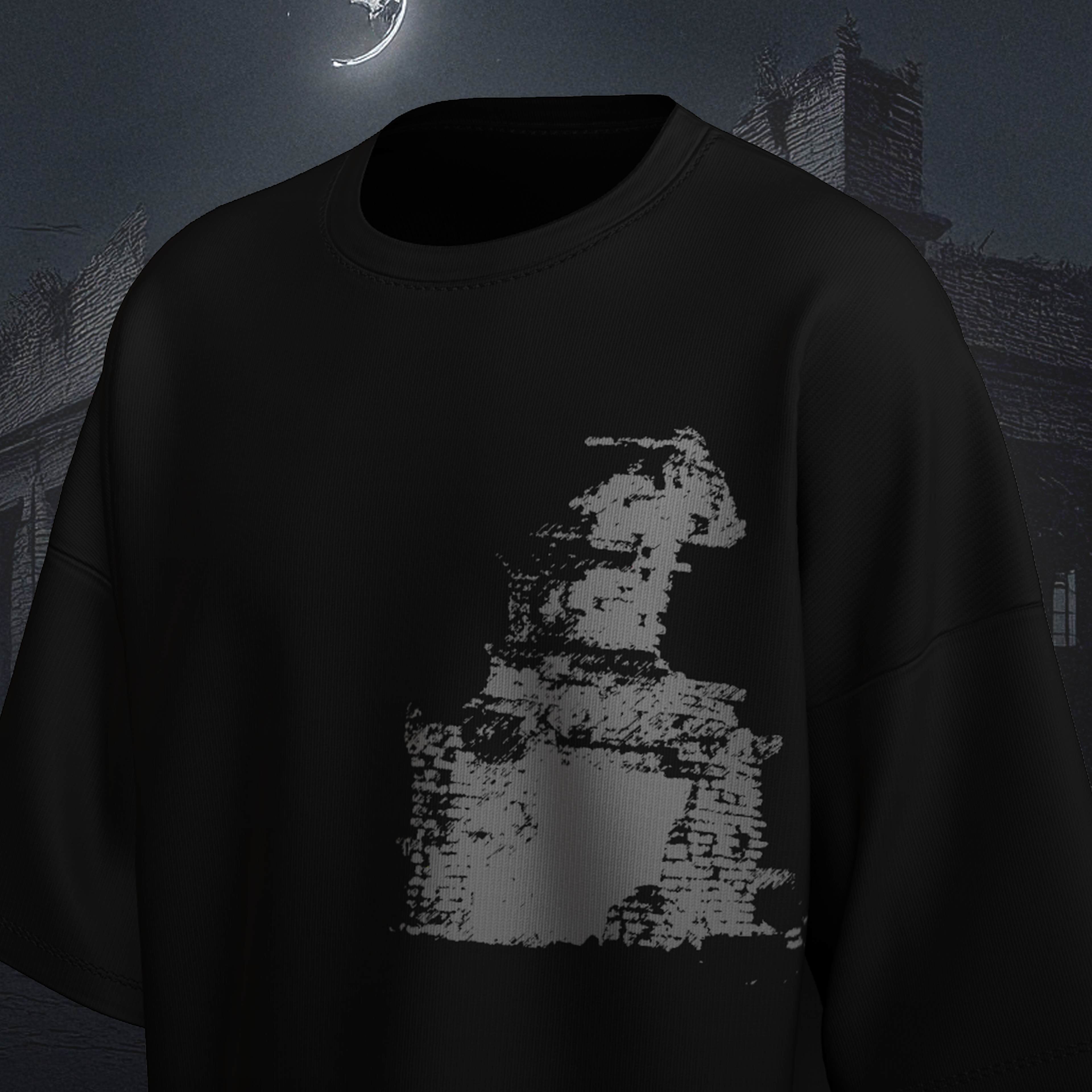 Black oversized t-shirt with a white graphic design on a dark background