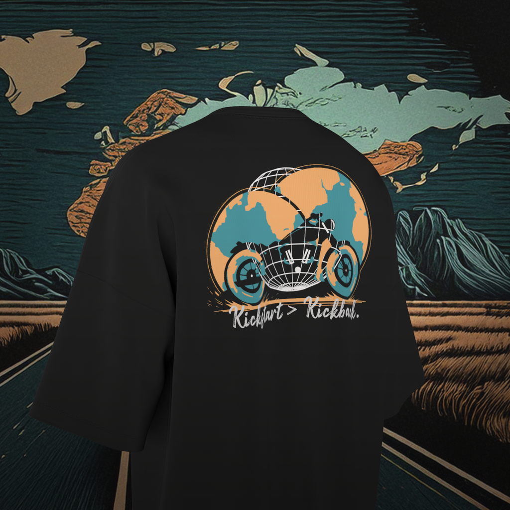 Black oversized t-shirt with a graphic design on the back against a world map background