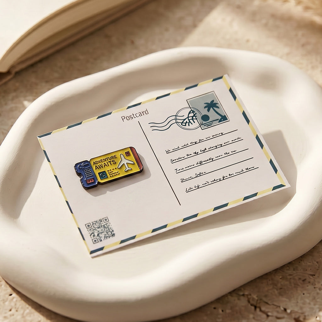 Postcard with a small electronic device on a textured surface