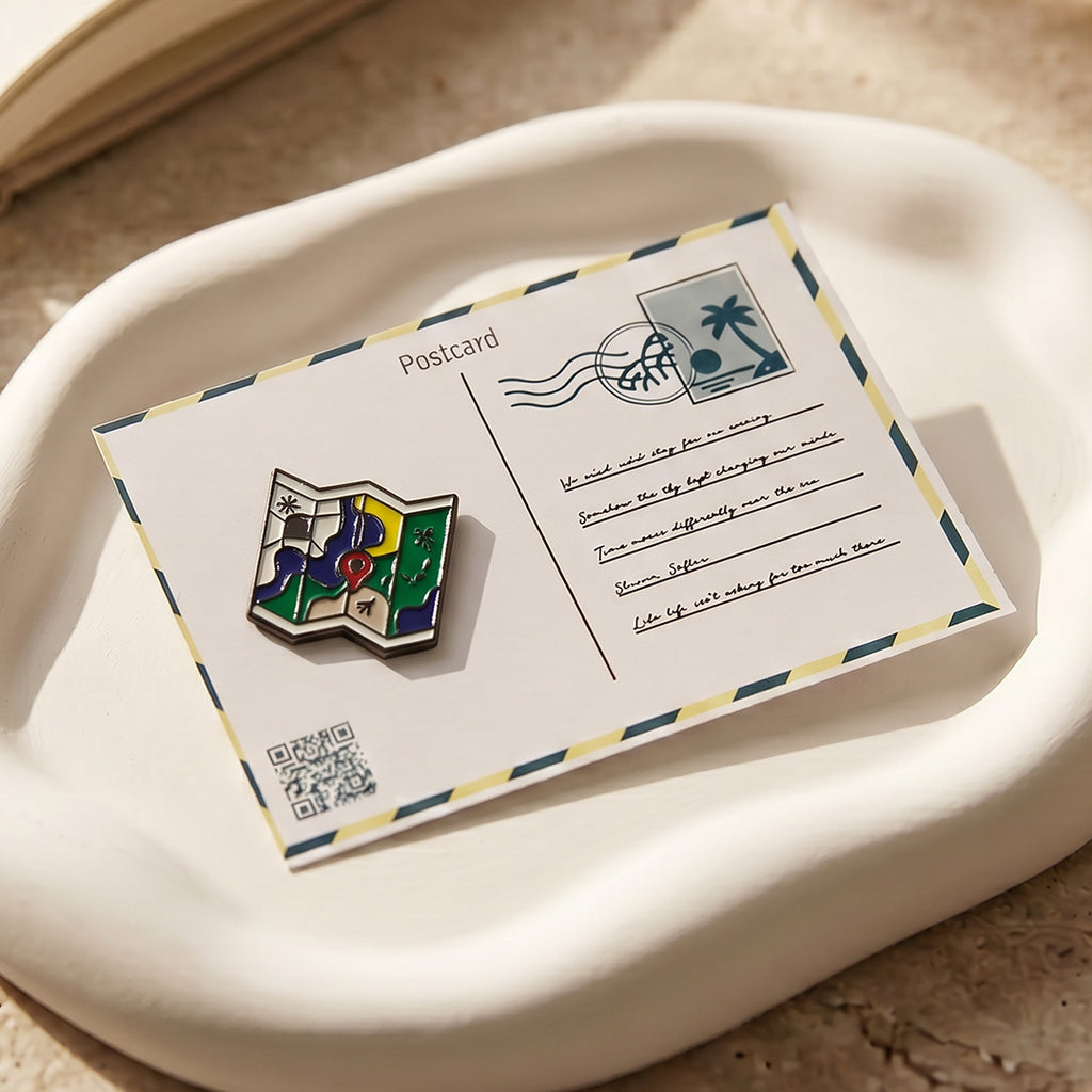 Pin on a postcard with a decorative design on a beige surface