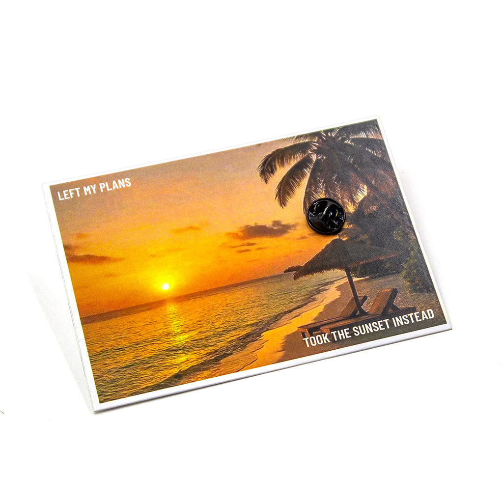 Card with a sunset design and text on a white background