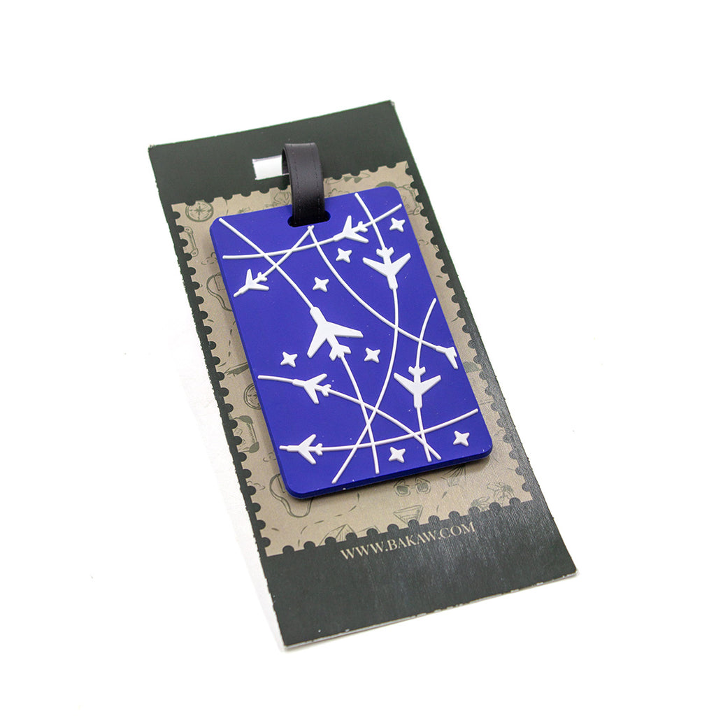Blue luggage tag with airplane design on a black card
