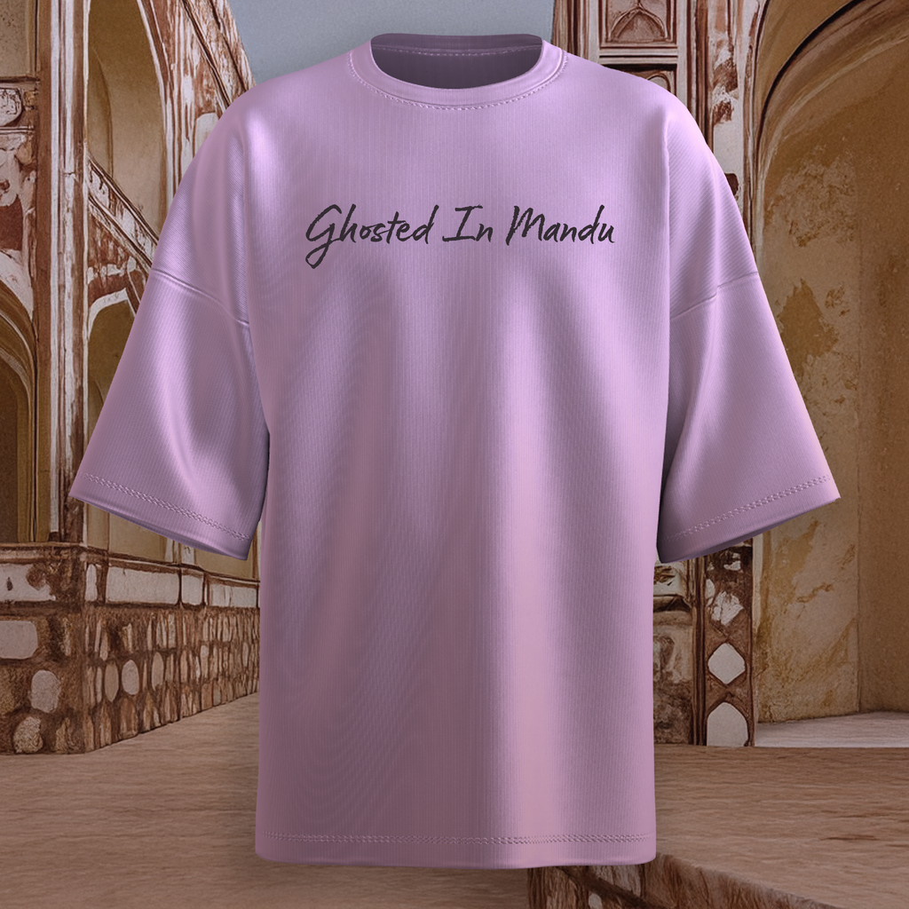 Lavender oversized  t-shirt with 'Ghosted In Mandu' text against a decorative architectural background