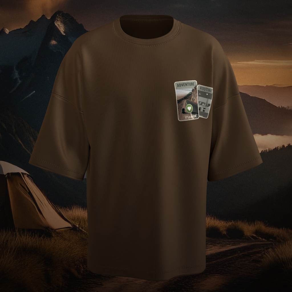 Brown oversized  t-shirt with a graphic design on a camping background