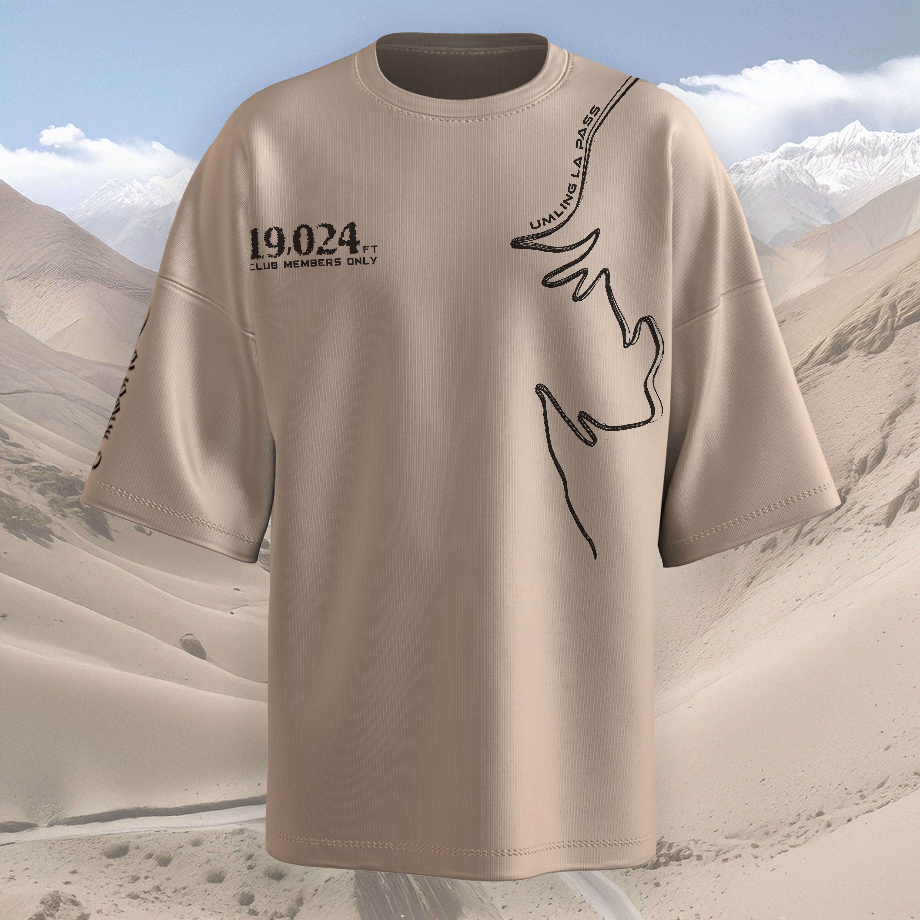 Beige oversized  t-shirt with black text and graphics on a desert background