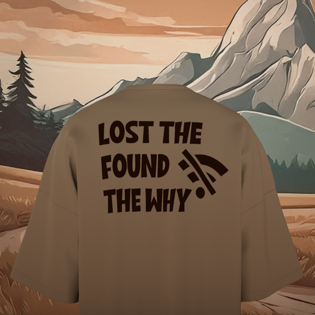 Brown oversized t-shirt with 'Lost the WIFI Found, The Why' text against a mountainous landscape.