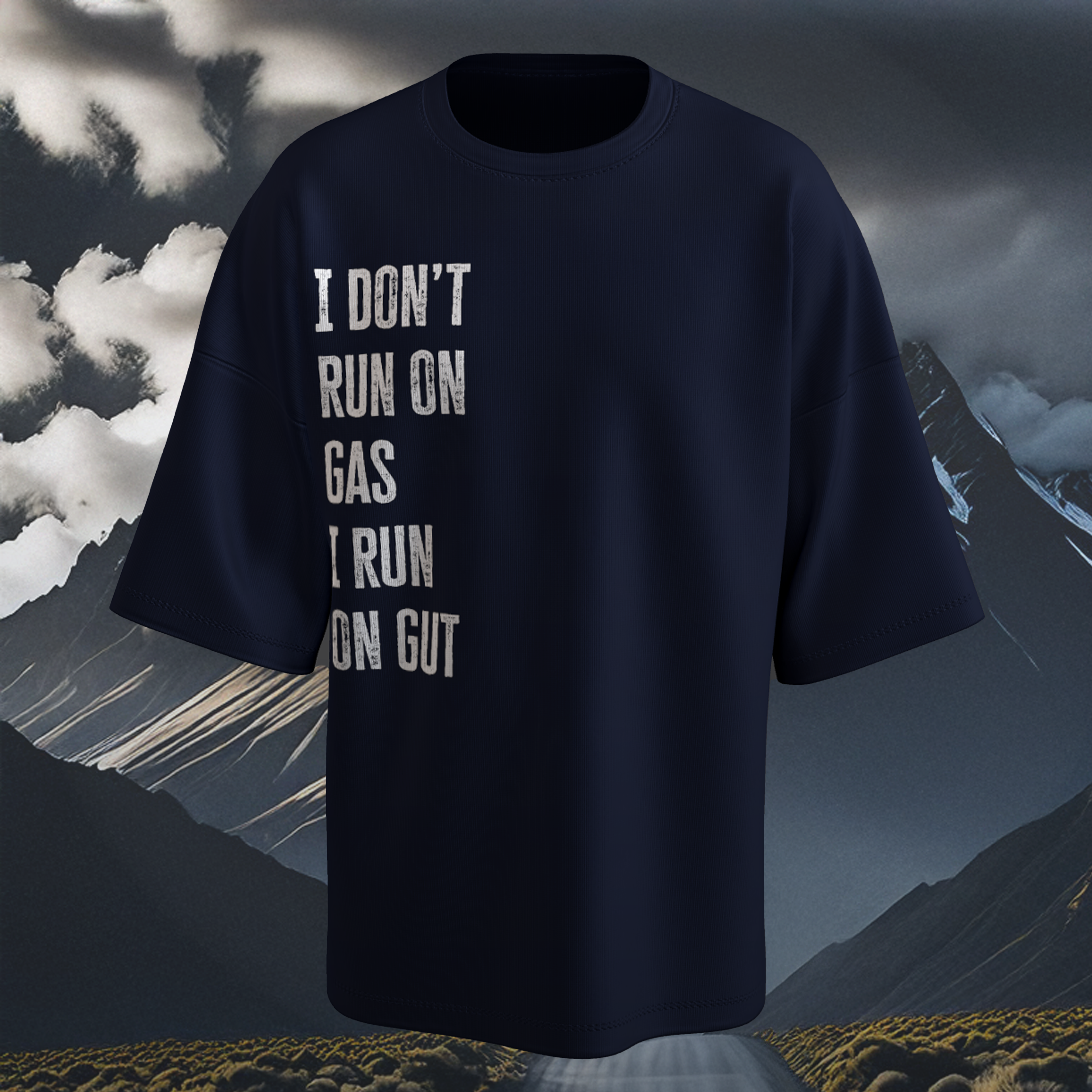 Navy Blue Oversized t-shirt with text 'I DON'T RUN ON GAS I RUN ON GUT' against a mountainous background