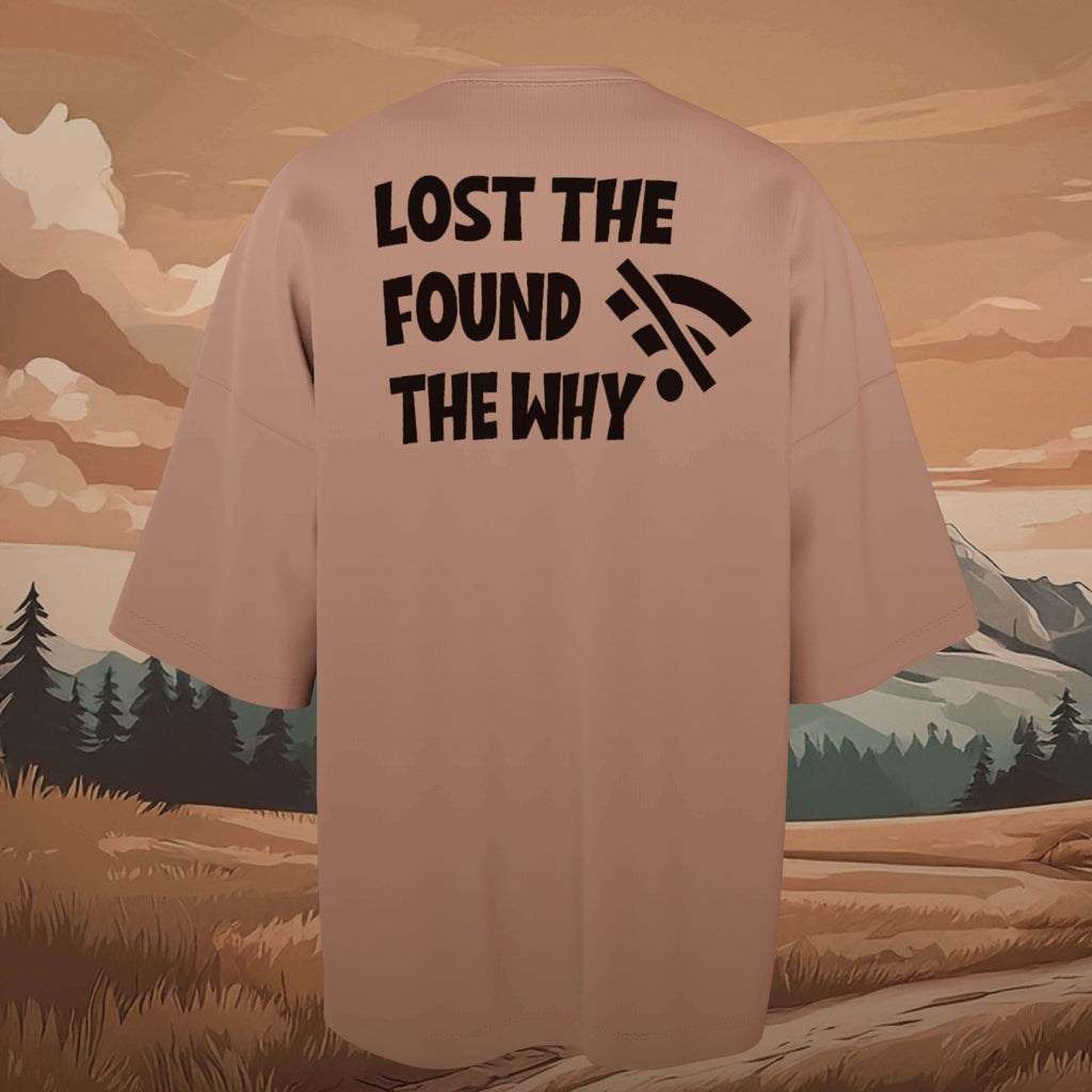Lost the wifi Beige oversized t-shirt with text 'Lost the WIFI Found the Why' on the back, against a nature-themed background.